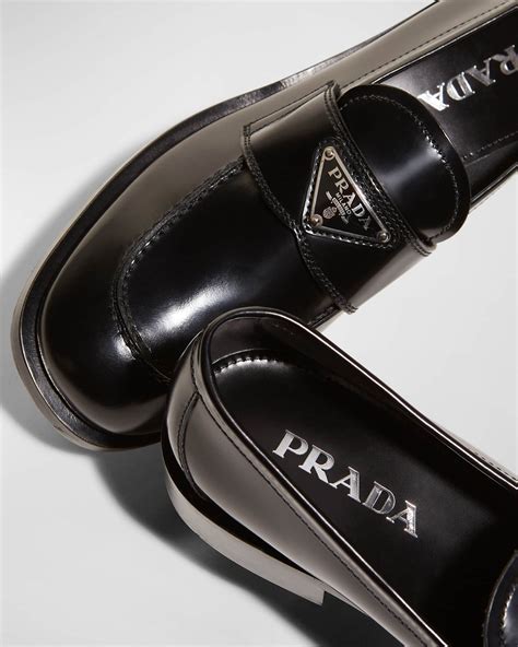 prada calfskin logo flat loafers.